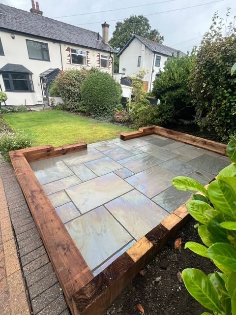 Edged with timber sleepers Edged with timber sleepers