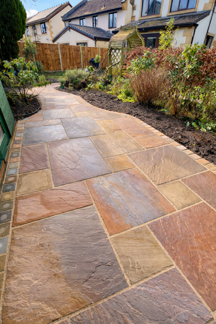 Raj sandstone flags edged with matching setts