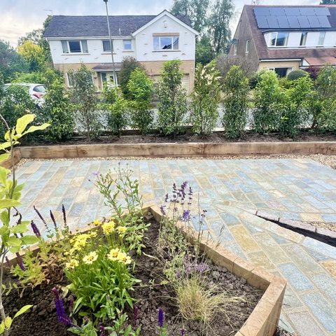 A large garden redesign project including newly turfed lawns, flower beds finished with mulch bark