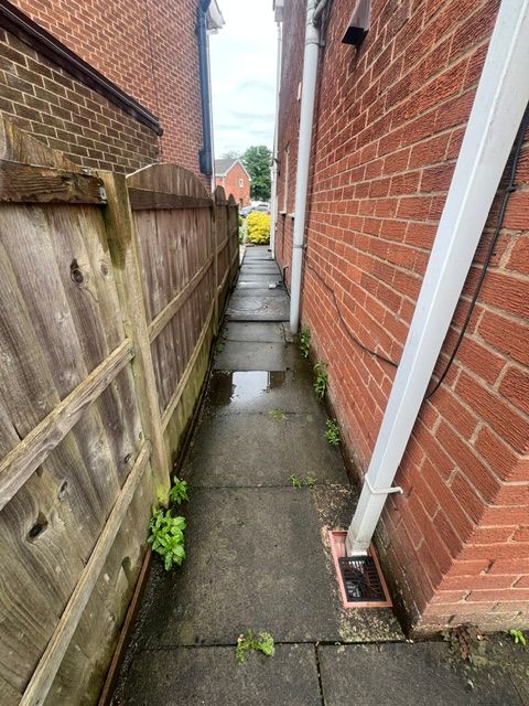 Original walkway with raised manhole Original walkway with raised manhole