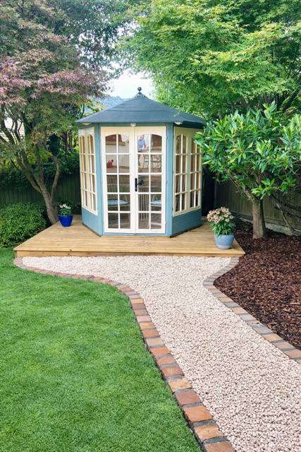 Install of summer house, deck construction with new gravel path