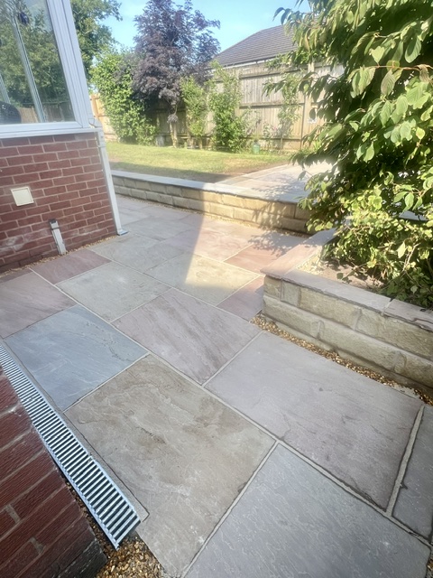 Yorkshire stone retaining wall with raj sandstone flags Yorkshire stone retaining wall