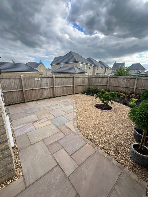 Raj indian sandstone flags in mixed sizes, edged with matching cobbles Raj indian sandstone flags in mixed sizes, edged with matching cobbles